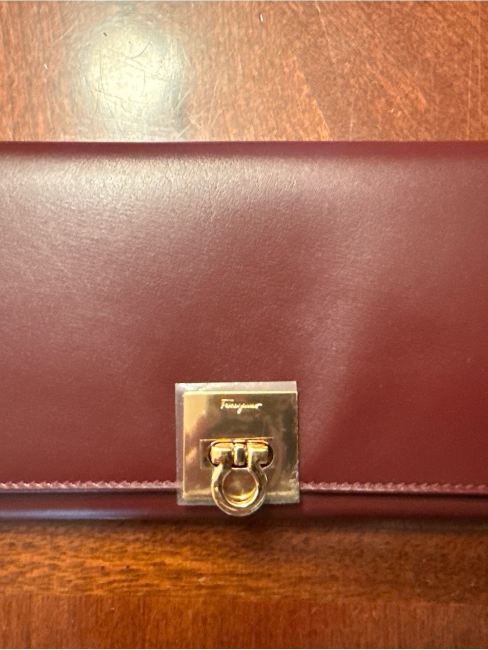 Salvatore Ferragamo Burgundy Leather Wallet with Gold Hardware
